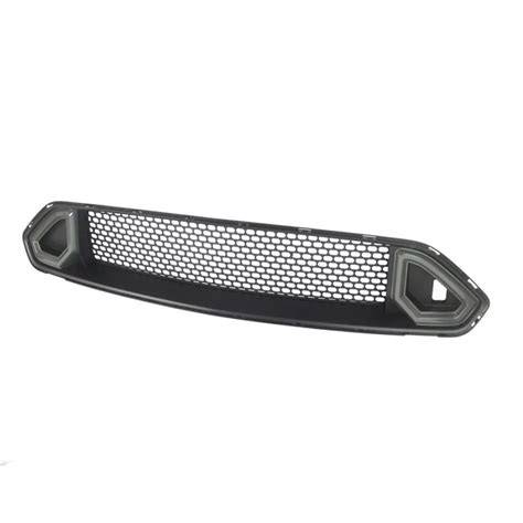 Detail karoserie s maskou chladiče a LED světly Clio VI.