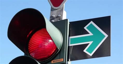 Zelené šipky signalizující blinkry