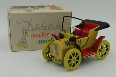 Obrázek kovového modelu dědeček automobil v měřítku 1:25, se žlutým lakem a plastovými detaily