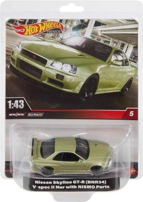 obrázek kovového autíčka Nissan GT-R v zelené barvě s kytičkami