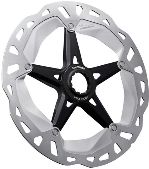 Detailní pohled na brzdový kotouč Shimano XT s viditelnou sendvičovou konstrukcí