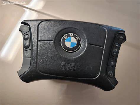 Schéma uspořádání tlačítek multifunkce na volantu BMW E39