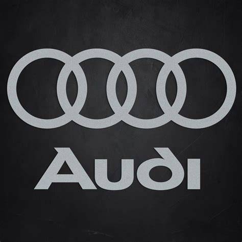 Fotografie detailu loga Audi A7 na kožené klíčence