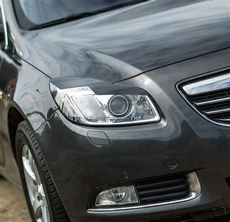 Fotografie černých LED předních světel pro Opel Zafira A