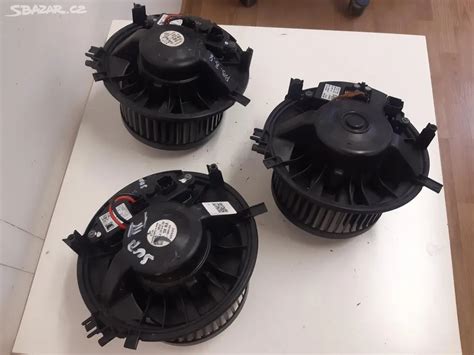 rozložený ventilátor topení s viditelnými lopatkami a motorem