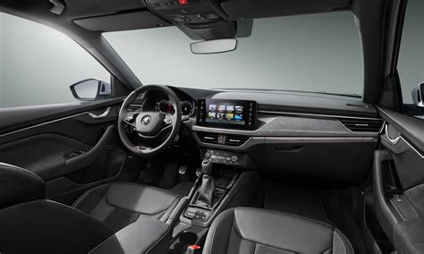 Interiér modernizované Škody Rapid s důrazem na prostornost a Simply Clever prvky.