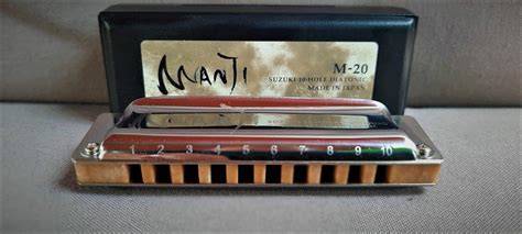 Suzuki Manji M-20 harmonika zblízka