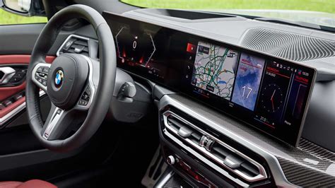 Interiér BMW Curved Display a sportovní sedadla