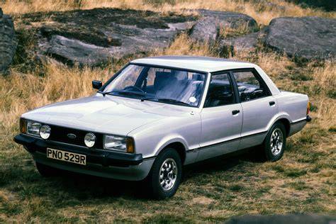Ford Cortina Mk I a další historické varianty - různorodé koncové a boční profily, ilustrující evoluci designu.