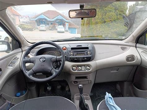 Nissan Almera Tino palubní deska uspořádání ovládacích prvků