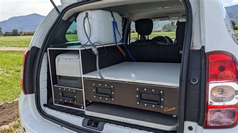 Camping Box Dacia Duster - rozložený rám postele