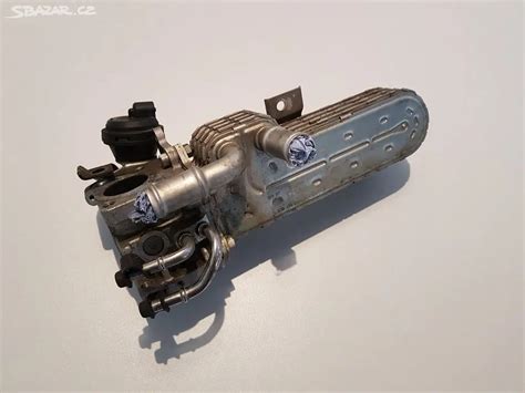 Detailní pohled na chladič spalin s vyznačenými přípoji