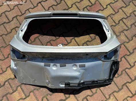 Schéma montáže mříže do kufru Ford Focus