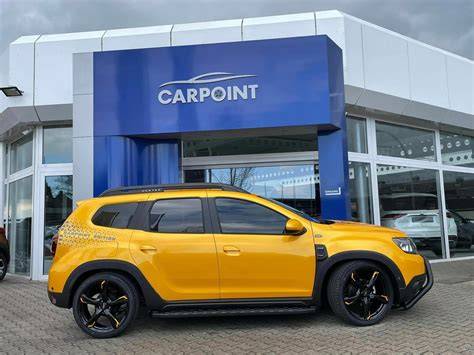 Oranžová ladění a Carpoint Edition na voze Duster