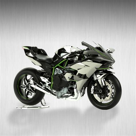 Ilustrační foto závodního motocyklu Kawasaki s laděným výfukovým systémem