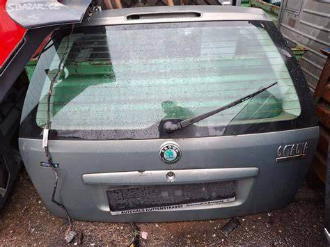 Obrázek ukazující páté dveře kufru Renault Mégane II kombi s poznámkou o korozi