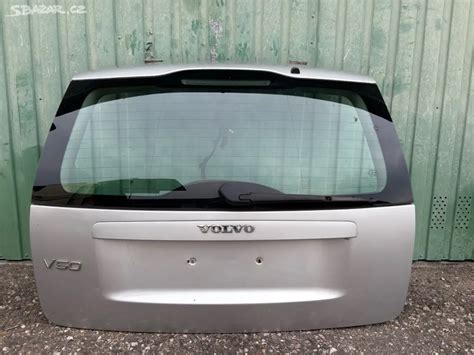 madlo kufru Volvo V50 - detail montáže