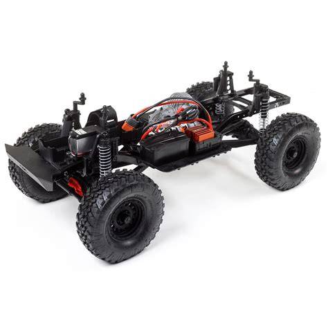Logo Axial SCX10 II a kryt převodovky - vizuální přehled komponent