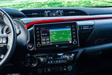 Fotografie interiéru Hilux s detailními prvky ovládání
