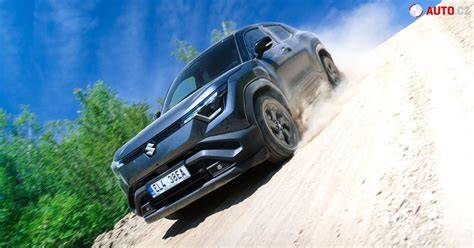 Obrázek: Grand Vitara v terénu s ukazatelem režimů 4x4