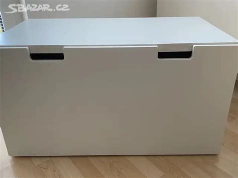 Schéma rozkládací lavice Reimo V3000 s vyznačenými rozměry a úložným prostorem