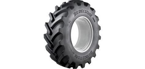 Schéma traktoru s vyznačenými pneumatikami Bridgestone VX-R TRACTOR a popisem výhod širokého běhounu.